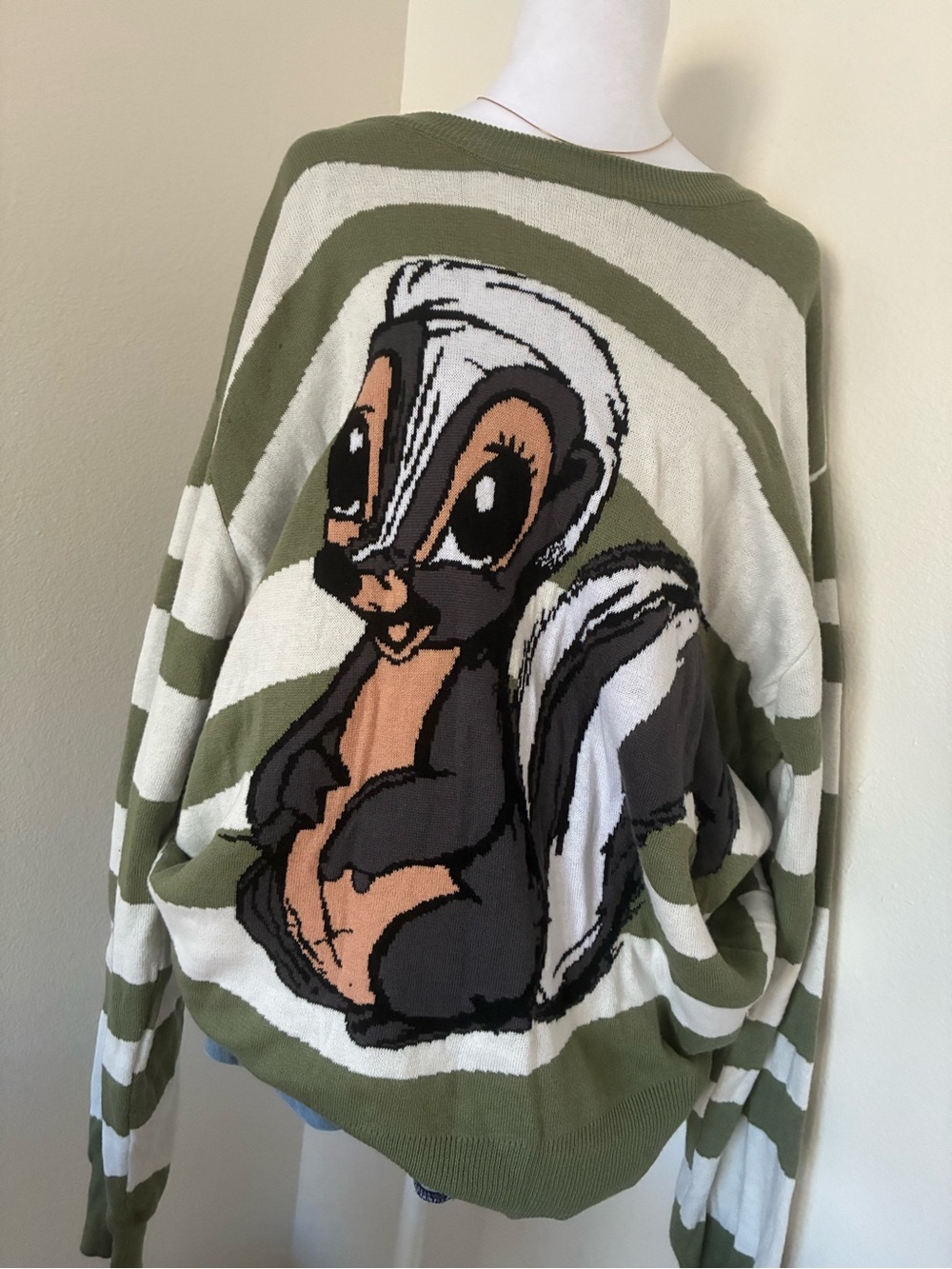 green & white striped Disney pullover sweater skunk flower from Bambi 💚🌸🦨